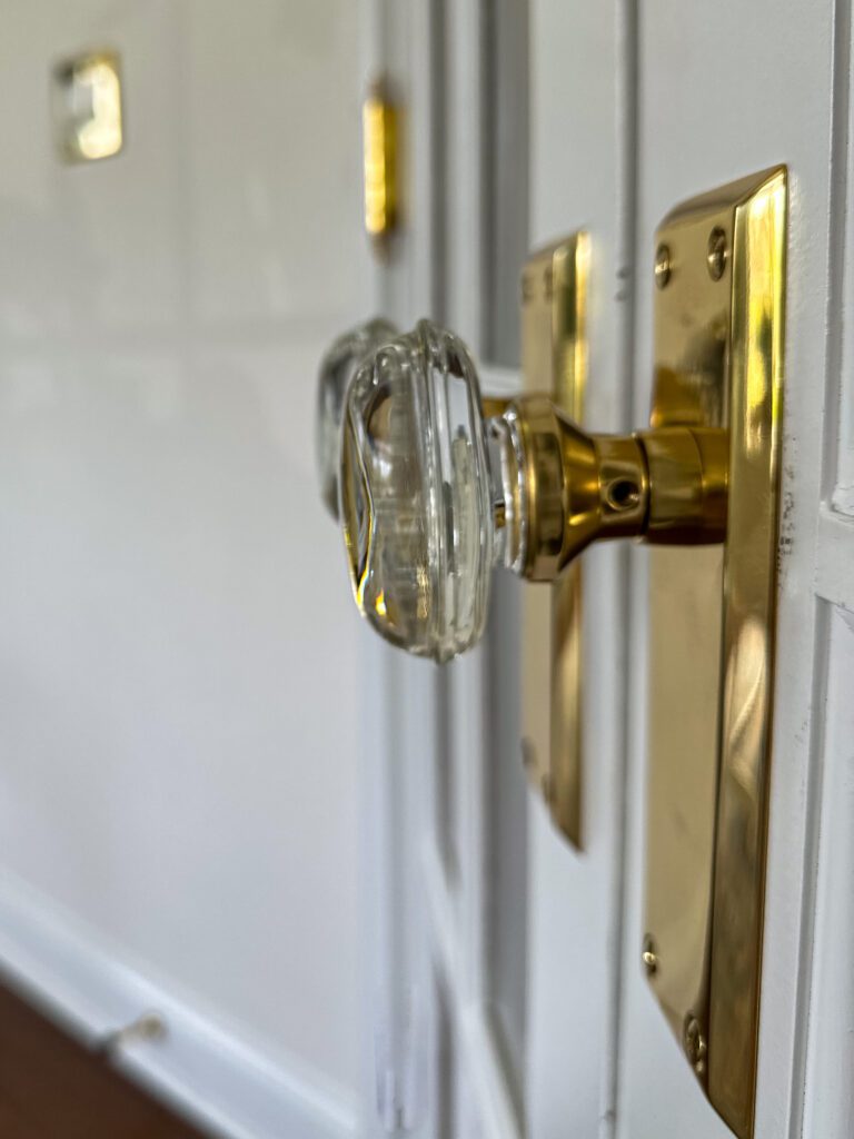 Polished Brass and Crystal Knobs on French Doors

