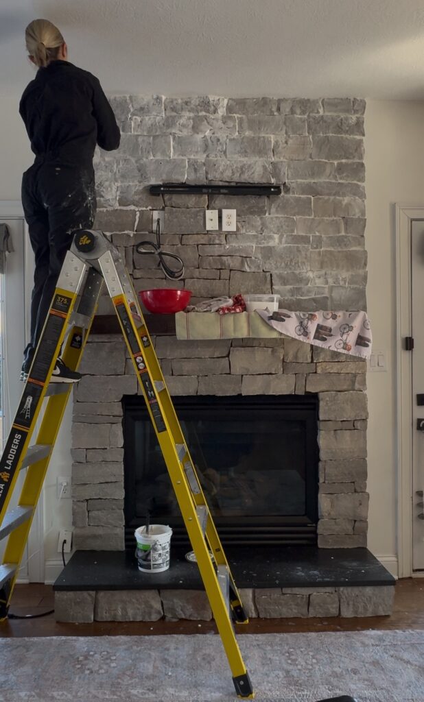 Here I am adding mortar between the stones using my grout bag.